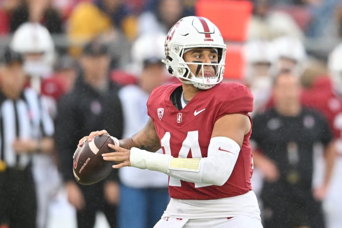 Nov 18, 2023; Stanford, California, USA; Stanford Cardinal quarterback Ashton Daniels (14) looks to throw a pass against the California Golden Bears during the first quarter at Stanford Stadium. Mandatory Credit: Robert Edwards-USA TODAY Sports
